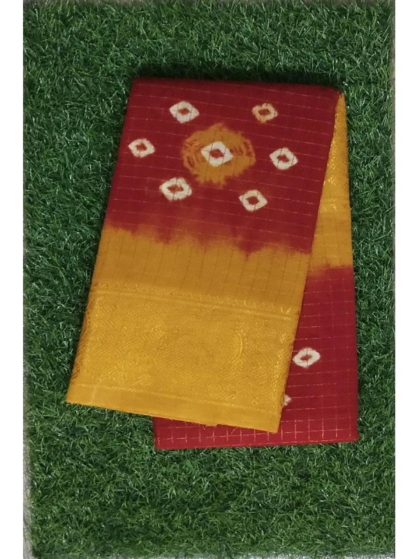 The mustard-yellow pallu highlights a large, intricate Shibori or tie-dye mandala design in the center -SCS00161