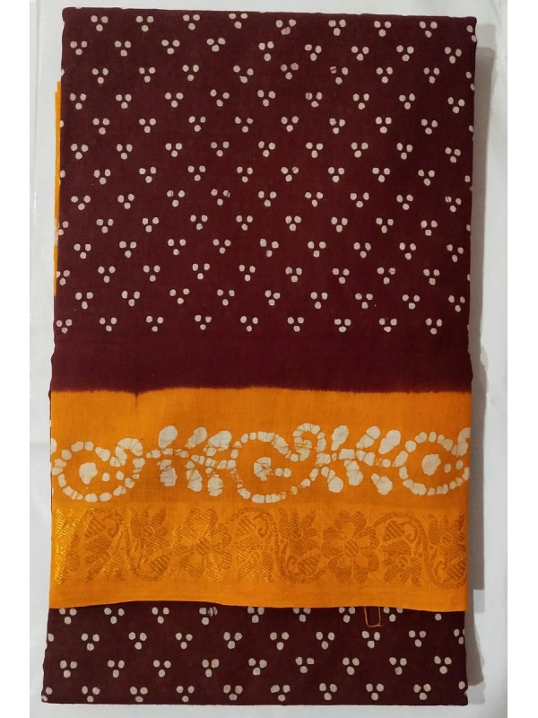 A deep coffee-brown body contrasted with warm ochre-yellow borders and pallu -SCS00321