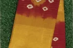 The mustard-yellow pallu highlights a large, intricate Shibori or tie-dye mandala design in the center -SCS00161 Thumbnail Image 1