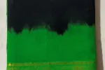 This saree features Shibori-style bleed transitions between the green and black sections, along with traditional Bandhani (tie-dye) motifs -SCS00231 Thumbnail Image 1