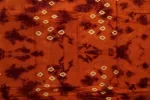 Highlighting the warm, glowing contrast between the orange and the dark wine tones -SCS00221 Thumbnail Image 2